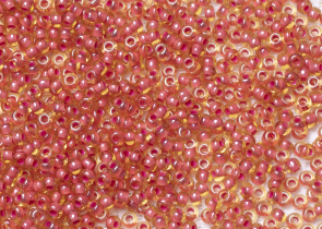 Бисер Чехия круглый 10/0 50г 11396 прозрачный светло-янтарный с розовым прокрасом (кораллово-красный, розоватый)